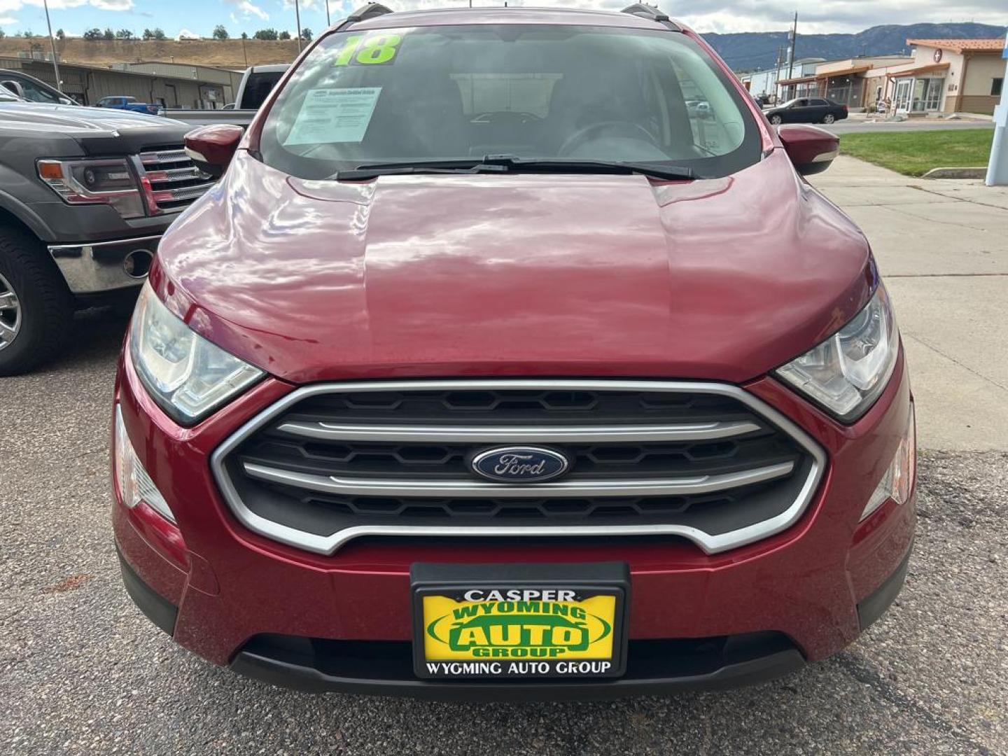 2018 red Ford Ecosport SE (MAJ6P1ULXJC) with an 4 Cyl, 2.0L engine, Automatic transmission, located at 3030 CY Ave, Casper, WY, 82604, (307) 265-3830, 42.827816, -106.357483 - Discover the perfect blend of versatility and efficiency with our 2018 Ford EcoSport SE, now available at our dealership. This compact SUV comes equipped with a reliable 4WD system, ensuring confident handling in various driving conditions. Under the hood, you'll find a responsive 4 Cyl, 2.0L engine - Photo#2