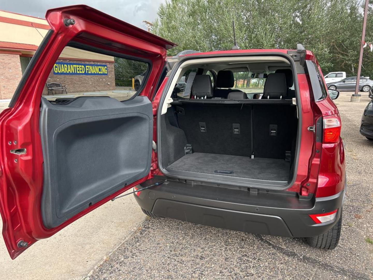 2018 red Ford Ecosport SE (MAJ6P1ULXJC) with an 4 Cyl, 2.0L engine, Automatic transmission, located at 3030 CY Ave, Casper, WY, 82604, (307) 265-3830, 42.827816, -106.357483 - Discover the perfect blend of versatility and efficiency with our 2018 Ford EcoSport SE, now available at our dealership. This compact SUV comes equipped with a reliable 4WD system, ensuring confident handling in various driving conditions. Under the hood, you'll find a responsive 4 Cyl, 2.0L engine - Photo#11