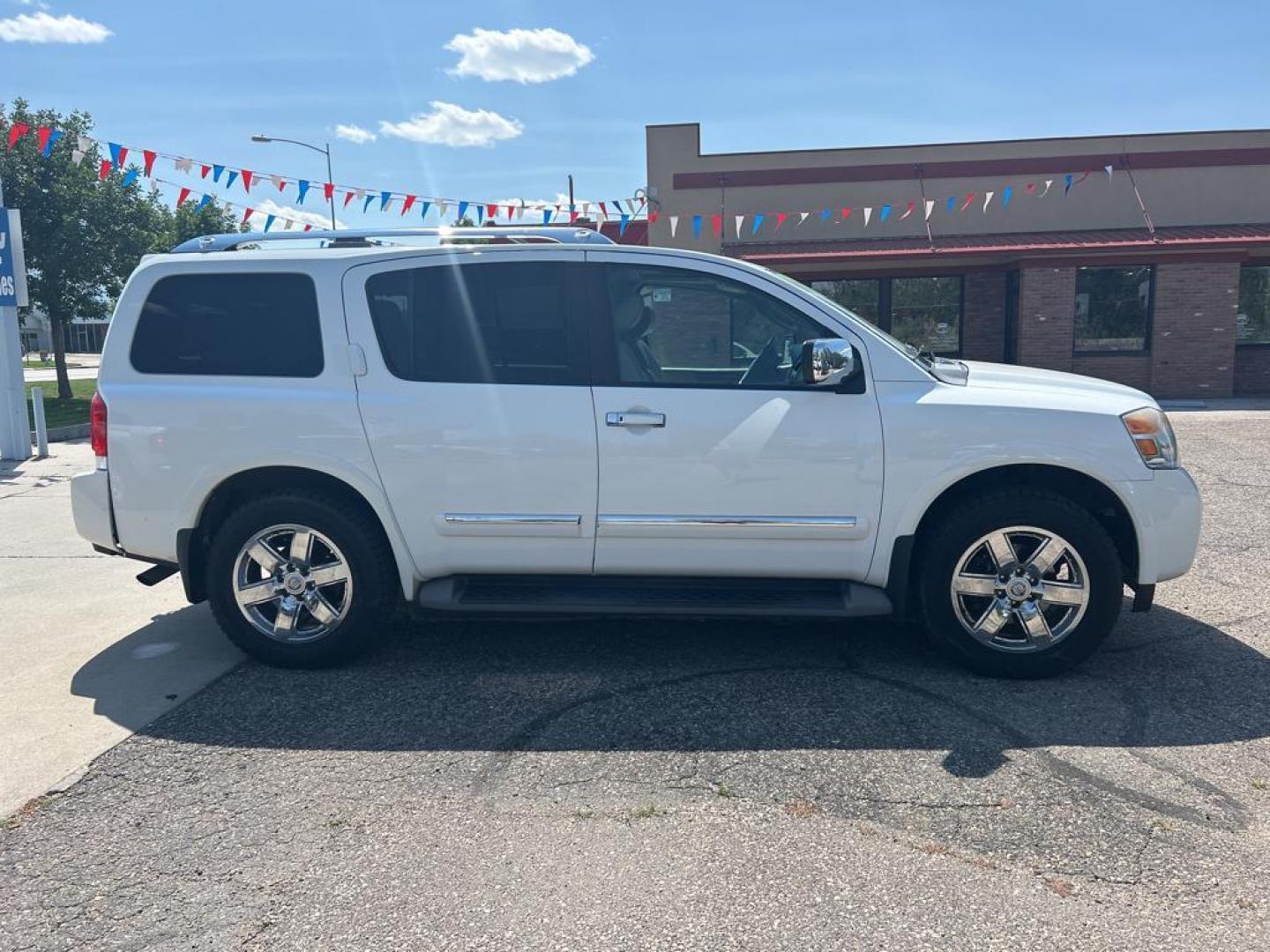 2012 White Nissan Armada PLATINUM (5N1BA0NE0CN) with an V8, 5.6L engine, Automatic transmission, located at 3030 CY Ave, Casper, WY, 82604, (307) 265-3830, 42.827816, -106.357483 - Photo#4