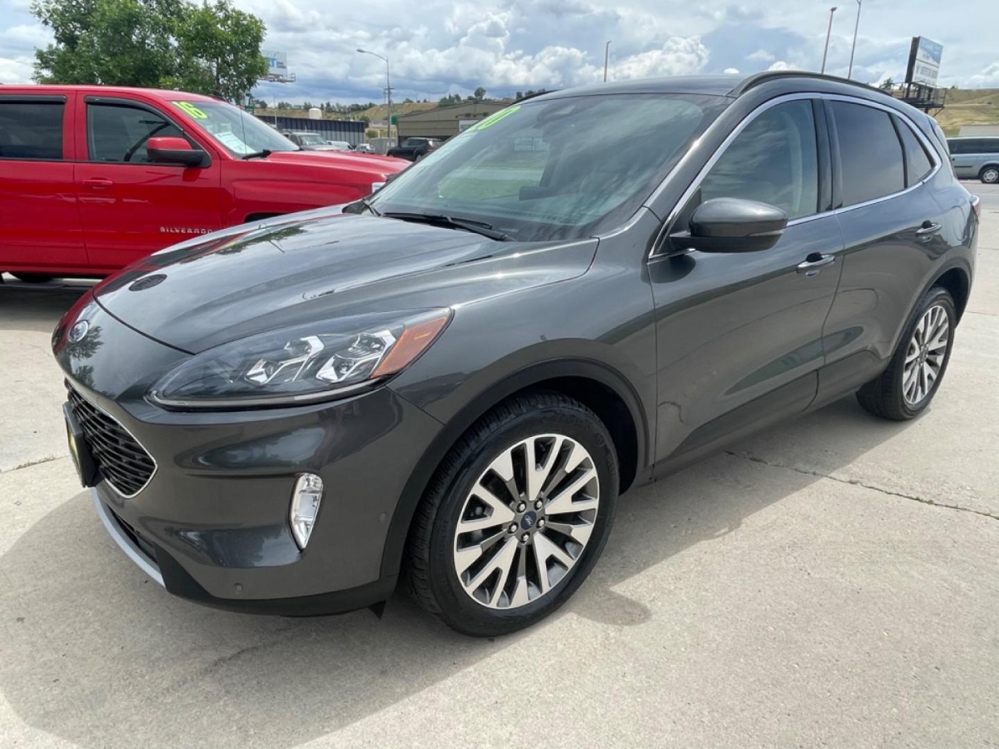 2020 GRAY /Tan FORD ESCAPE TITANIUM (1FMCU9J98LU) with an 2.0L engine, Automatic transmission, located at 3030 CY Ave, Casper, WY, 82604, (307) 265-3830, 42.827816, -106.357483 - Photo#1