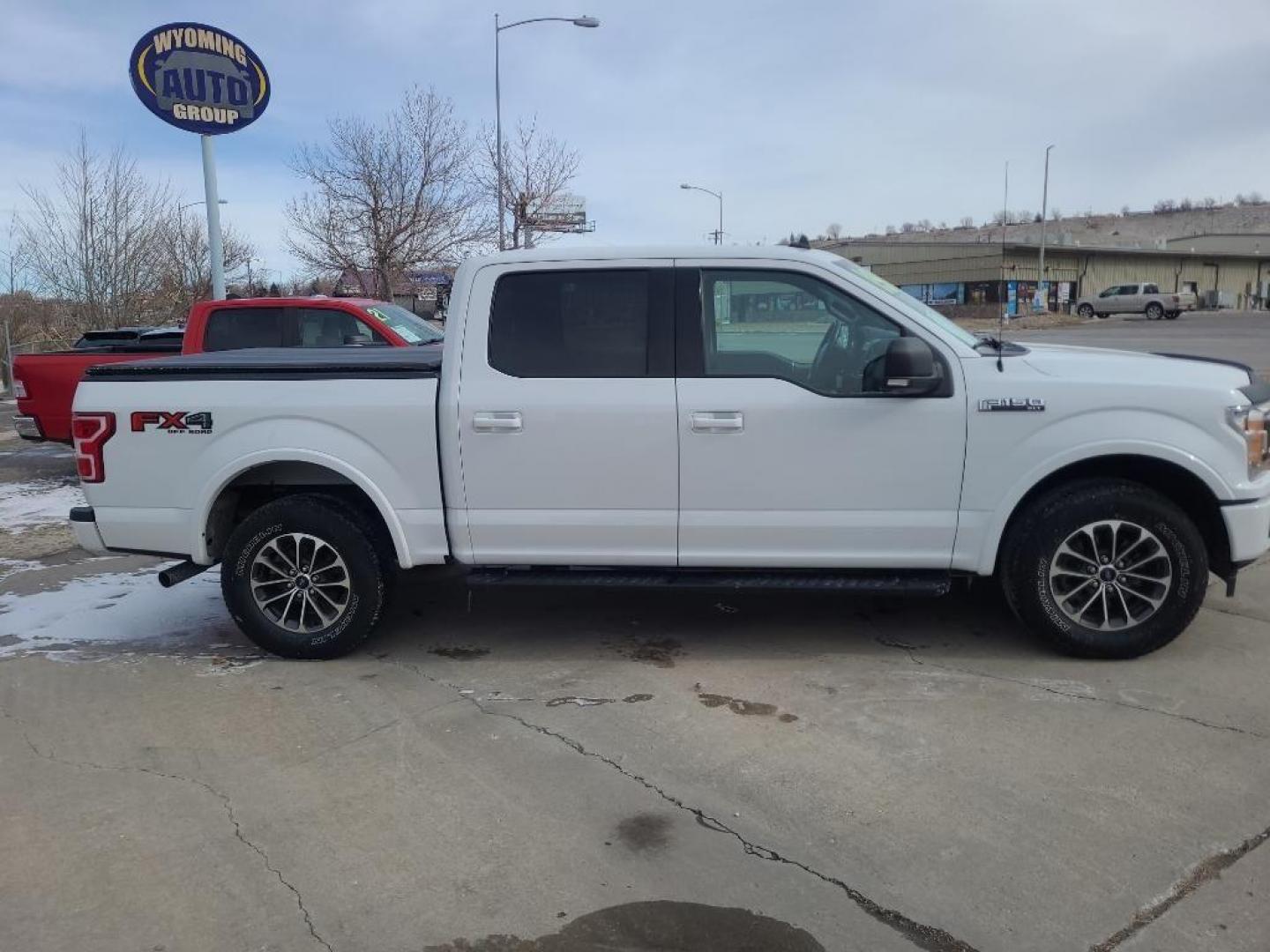 2019 WHITE Ford F-150 XLT FX4 (1FTEW1E47KF) with an V6, 3.5L engine, Automatic transmission, located at 3030 CY Ave, Casper, WY, 82604, (307) 265-3830, 42.827816, -106.357483 - Looking for a reliable, powerful truck that can tackle any job or adventure? Look no further than this stunning pre-owned 2019 Ford F-150 XLT !<br><br>This robust beast is equipped with a V6, 3.5L engine, delivering impressive power and performance for both work and play. Whether you're hauling heav - Photo#1