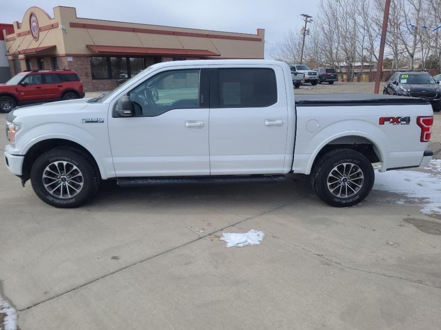 2019 WHITE Ford F-150 XLT FX4 (1FTEW1E47KF) with an V6, 3.5L engine, Automatic transmission, located at 3030 CY Ave, Casper, WY, 82604, (307) 265-3830, 42.827816, -106.357483 - Looking for a reliable, powerful truck that can tackle any job or adventure? Look no further than this stunning pre-owned 2019 Ford F-150 XLT !<br><br>This robust beast is equipped with a V6, 3.5L engine, delivering impressive power and performance for both work and play. Whether you're hauling heav - Photo#6