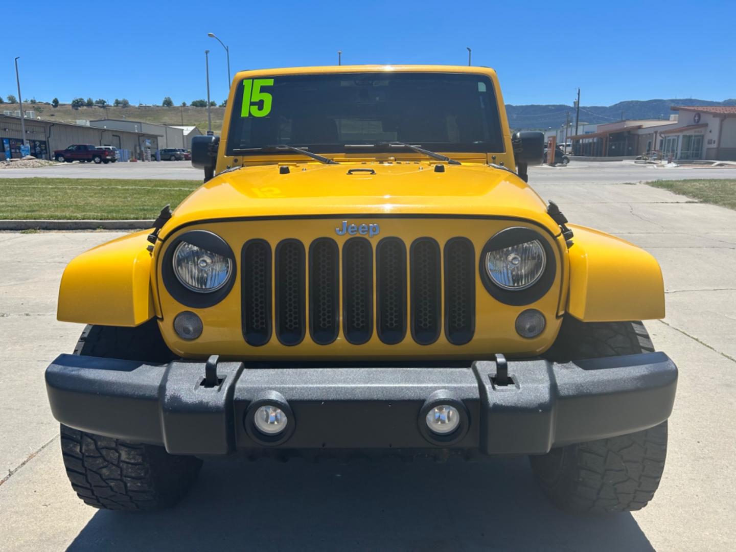 2015 YELLOW Jeep Wrangler Unlimited Sahara (1C4BJWEGXFL) with an V6, 3.6L engine, 6-Speed Manual transmission, located at 3030 CY Ave, Casper, WY, 82604, (307) 265-3830, 42.827816, -106.357483 - Get ready to conquer any terrain with this incredible 2015 Jeep Wrangler Unlimited Sahara! This rugged yet refined SUV is the perfect blend of power, style, and advanced technology, making it the ultimate adventure companion. Under the hood, you'll find a robust V6, 3.6L engine paired with a dependa - Photo#1