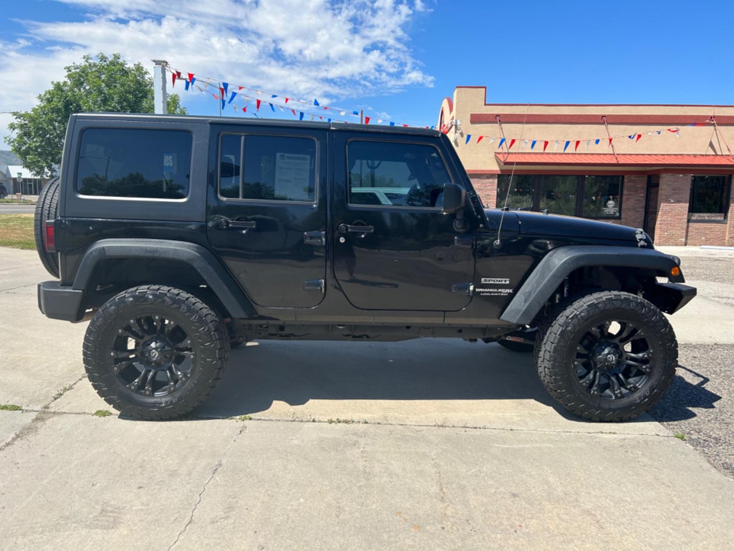 2018 BLACK /Black JEEP WRANGLER JK UNL SPORT (1C4BJWDG2JL) with an 3.6L engine, 6-Speed Manual transmission, located at 3030 CY Ave, Casper, WY, 82604, (307) 265-3830, 42.827816, -106.357483 - Photo#5