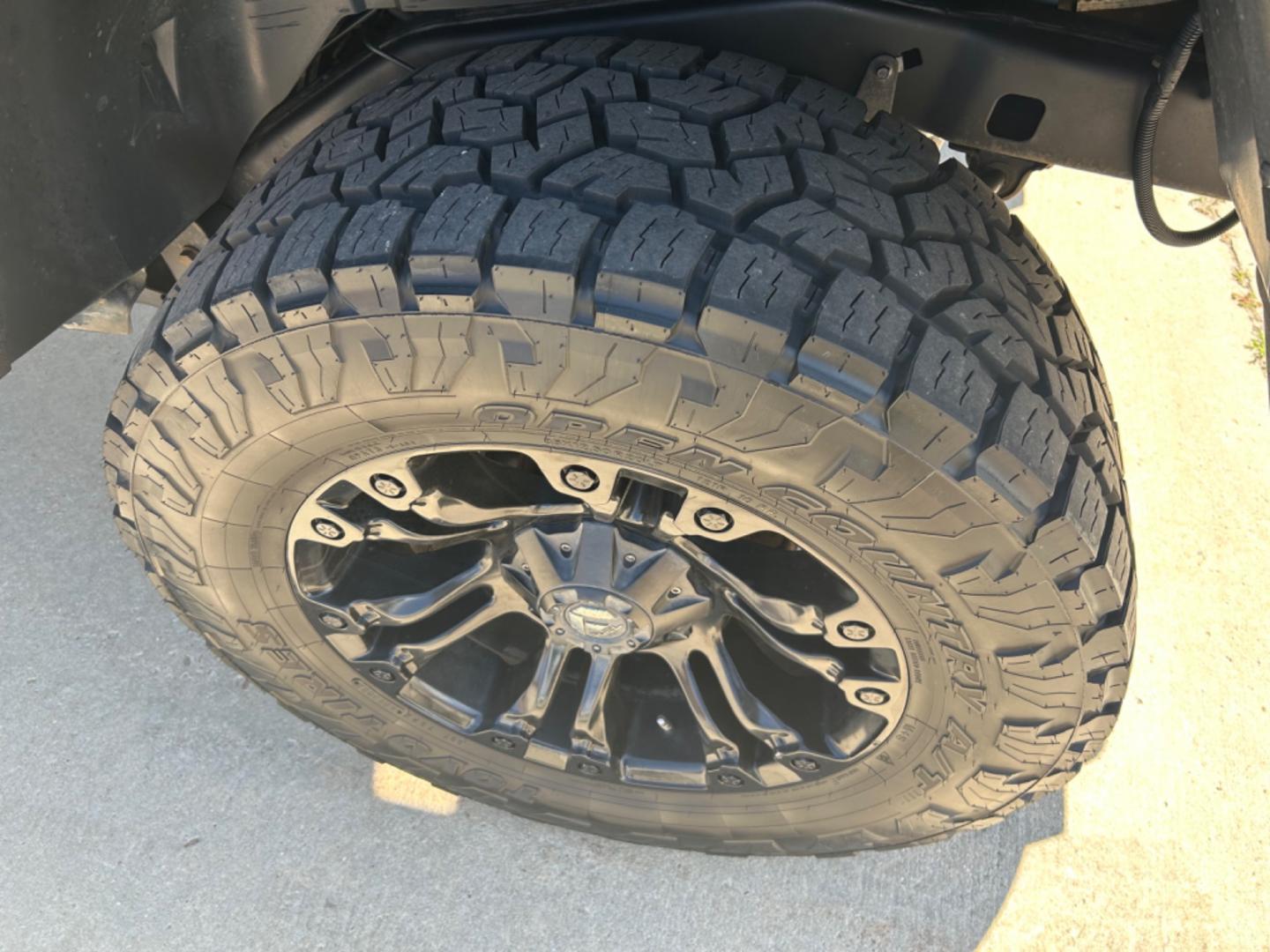 2018 BLACK /Black JEEP WRANGLER JK UNL SPORT (1C4BJWDG2JL) with an 3.6L engine, 6-Speed Manual transmission, located at 3030 CY Ave, Casper, WY, 82604, (307) 265-3830, 42.827816, -106.357483 - Photo#11