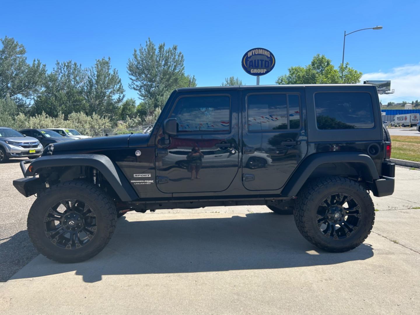 2018 BLACK /Black JEEP WRANGLER JK UNL SPORT (1C4BJWDG2JL) with an 3.6L engine, 6-Speed Manual transmission, located at 3030 CY Ave, Casper, WY, 82604, (307) 265-3830, 42.827816, -106.357483 - Photo#0