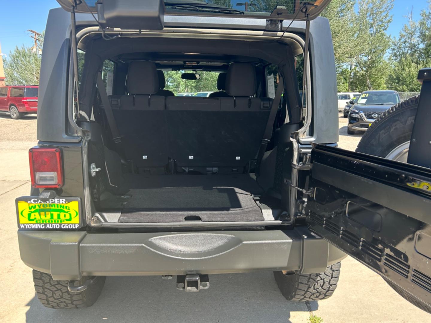 2018 BLACK /Black JEEP WRANGLER JK UNL SPORT (1C4BJWDG2JL) with an 3.6L engine, 6-Speed Manual transmission, located at 3030 CY Ave, Casper, WY, 82604, (307) 265-3830, 42.827816, -106.357483 - Photo#10