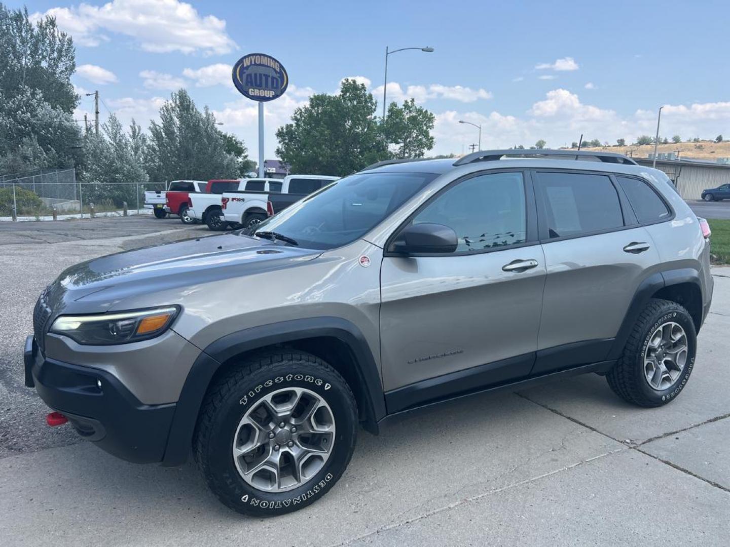 2020 Gray Jeep Cherokee Trailhawk (1C4PJMBXXLD) with an V6, 3.2L engine, Automatic transmission, located at 3030 CY Ave, Casper, WY, 82604, (307) 265-3830, 42.827816, -106.357483 - Discover the versatility of the 2020 Jeep Cherokee Trailhawk, a vehicle engineered to conquer both city streets and off-road trails with equal prowess. This well-maintained model features a potent V6, 3.2L engine that delivers a balanced blend of power and efficiency, ensuring a responsive and dynam - Photo#1