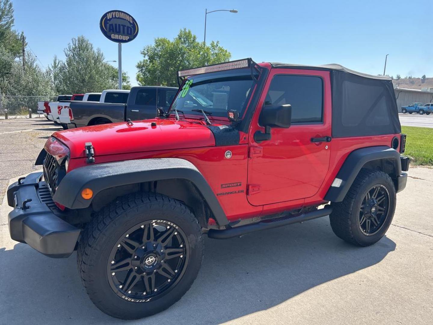 2016 red Jeep Wrangler sport (1C4AJWAG1GL) with an V6, 3.6L engine, Automatic transmission, located at 3030 CY Ave, Casper, WY, 82604, (307) 265-3830, 42.827816, -106.357483 - Photo#1