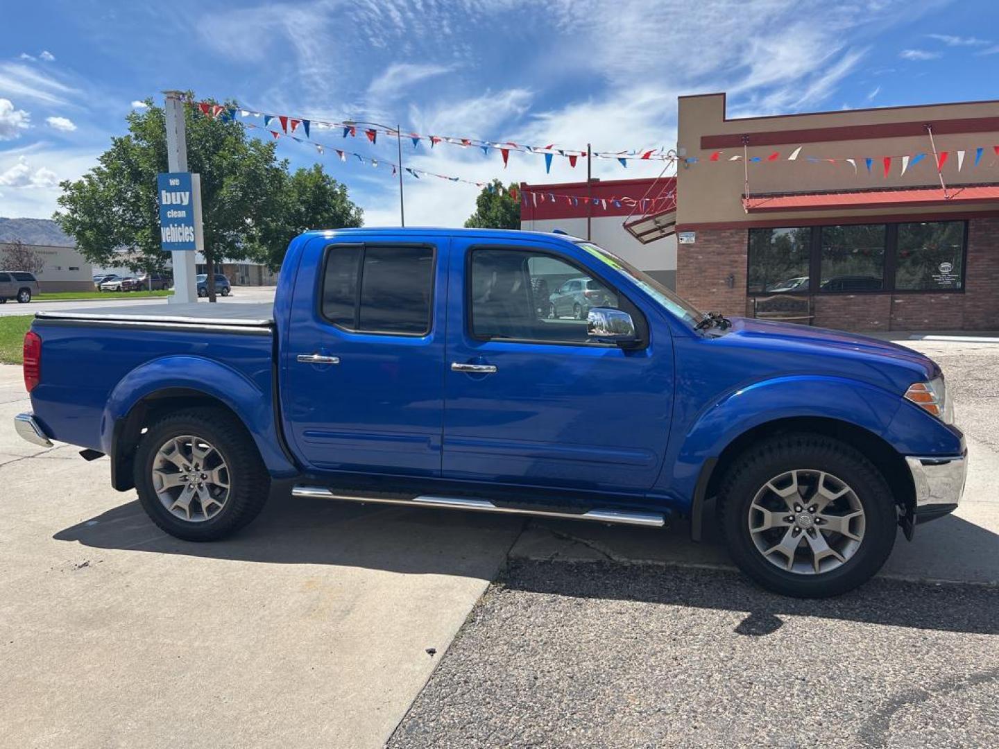 2014 blue Nissan Frontier SL (1N6AD0EV5EN) with an V6, 4.0L engine, Automatic transmission, located at 3030 CY Ave, Casper, WY, 82604, (307) 265-3830, 42.827816, -106.357483 - Photo#4