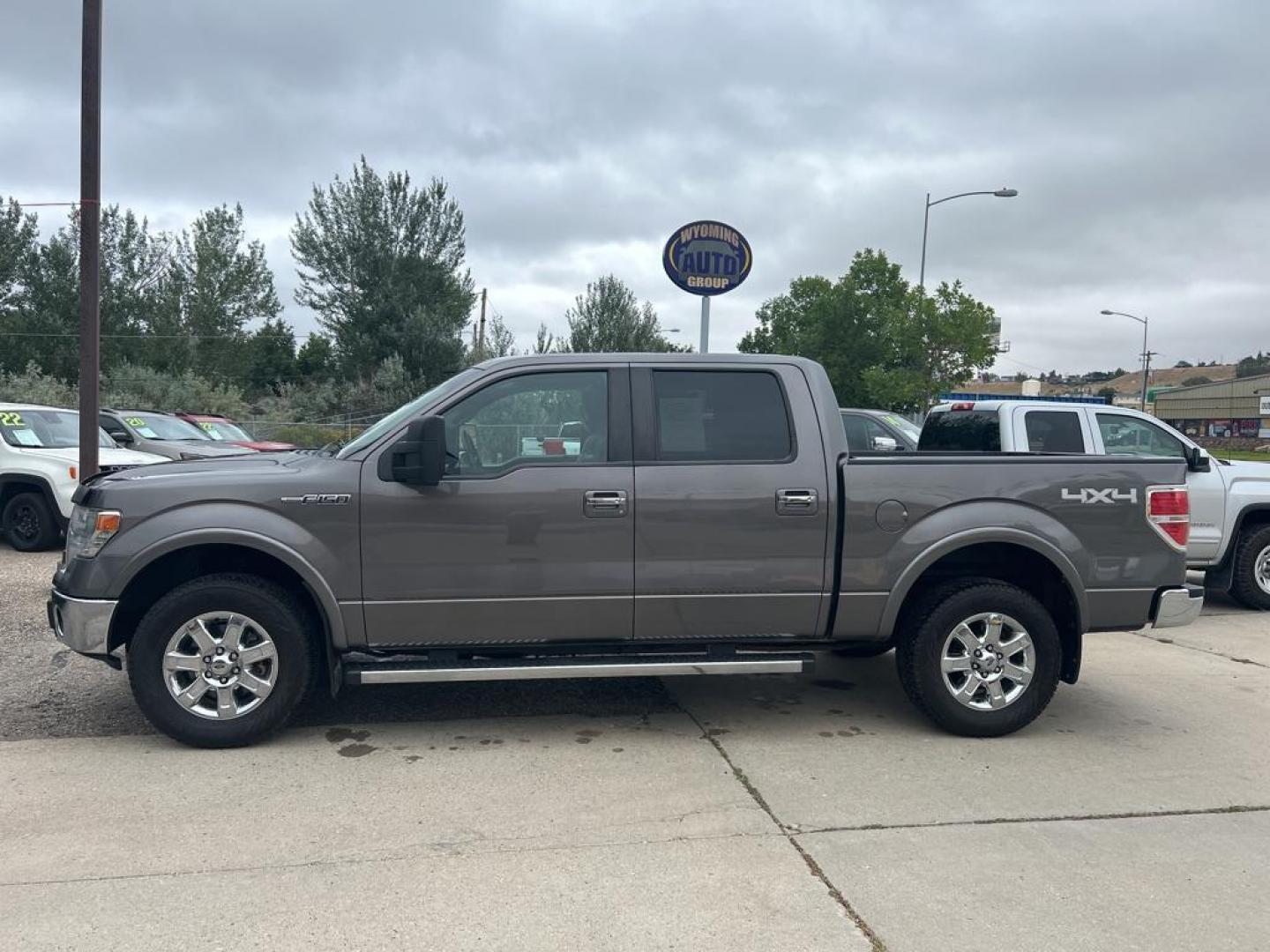 2014 Gray Ford F-150 Lariat (1FTFW1EF0EF) with an V8, 5.0L engine, Automatic 6-Speed transmission, located at 3030 CY Ave, Casper, WY, 82604, (307) 265-3830, 42.827816, -106.357483 - Inside, the F-150 Lariat offers a premium driving experience with its luxurious leather seats, providing both comfort and durability. The heated and cooled seats add an extra layer of coziness, making every journey more enjoyable. Stay connected and entertained with the integrated XM Radio and Hands - Photo#0