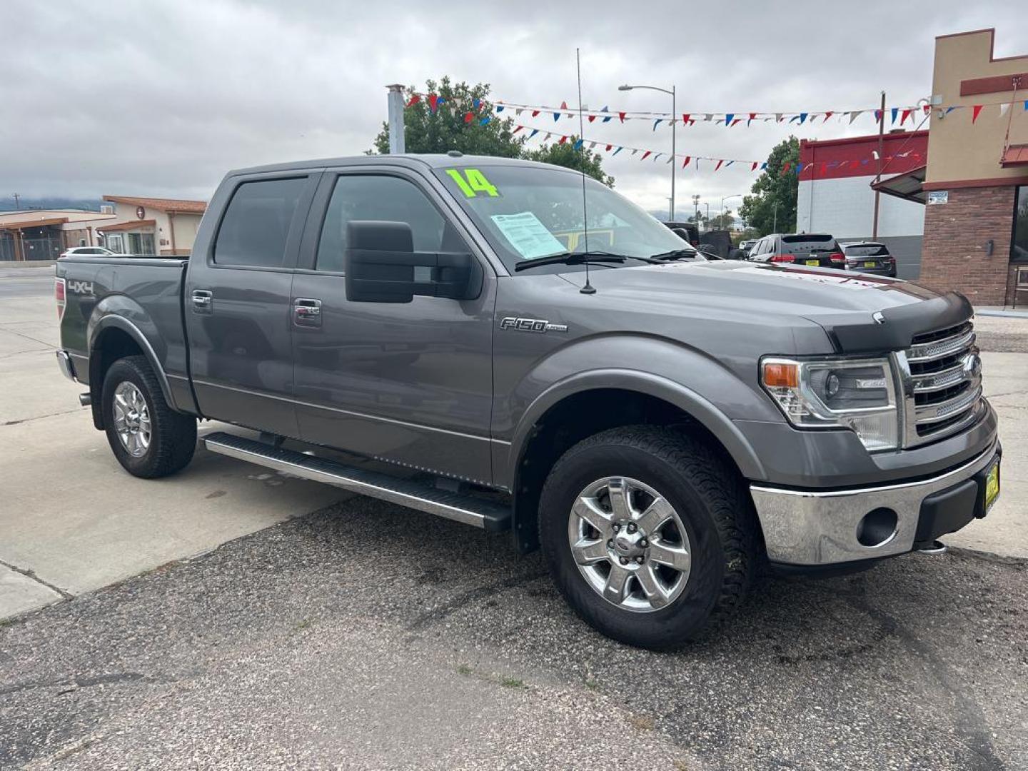 2014 Gray Ford F-150 Lariat (1FTFW1EF0EF) with an V8, 5.0L engine, Automatic 6-Speed transmission, located at 3030 CY Ave, Casper, WY, 82604, (307) 265-3830, 42.827816, -106.357483 - Inside, the F-150 Lariat offers a premium driving experience with its luxurious leather seats, providing both comfort and durability. The heated and cooled seats add an extra layer of coziness, making every journey more enjoyable. Stay connected and entertained with the integrated XM Radio and Hands - Photo#3