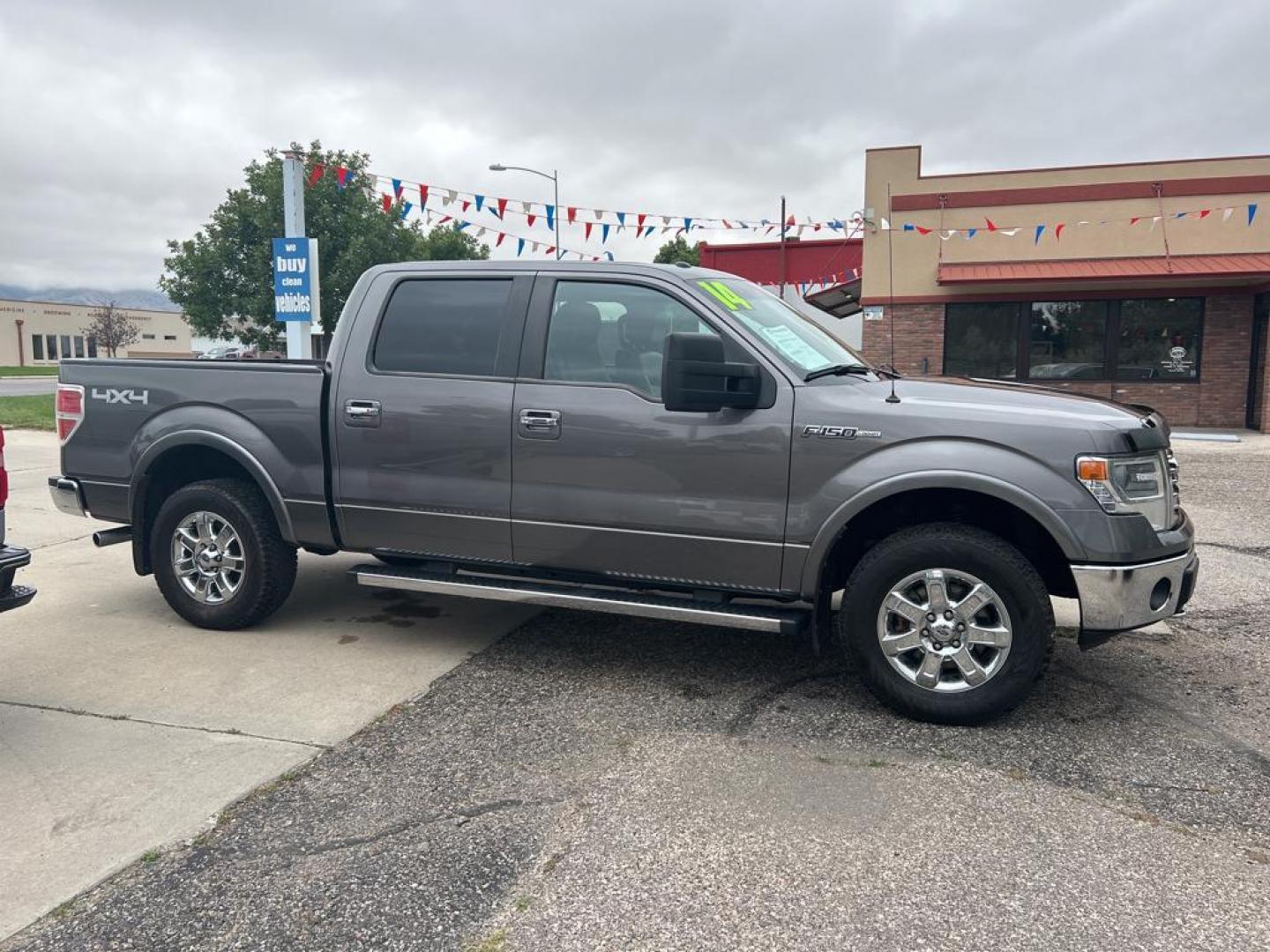 2014 Gray Ford F-150 Lariat (1FTFW1EF0EF) with an V8, 5.0L engine, Automatic 6-Speed transmission, located at 3030 CY Ave, Casper, WY, 82604, (307) 265-3830, 42.827816, -106.357483 - Inside, the F-150 Lariat offers a premium driving experience with its luxurious leather seats, providing both comfort and durability. The heated and cooled seats add an extra layer of coziness, making every journey more enjoyable. Stay connected and entertained with the integrated XM Radio and Hands - Photo#4