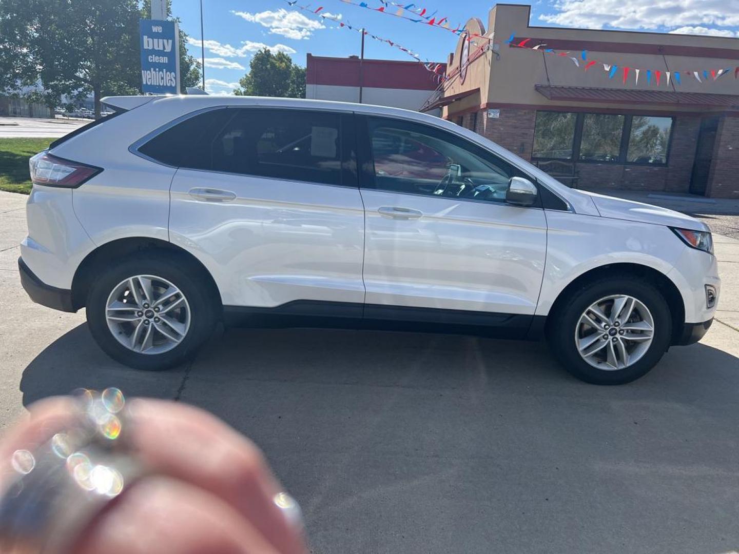 2018 white Ford Edge SEL (2FMPK4J92JB) with an 4 Cyl, 2.0L engine, Automatic transmission, located at 3030 CY Ave, Casper, WY, 82604, (307) 265-3830, 42.827816, -106.357483 - Introducing the dynamic and reliable 2018 Ford Edge SEL with AWD, a perfect blend of sophistication and performance! This remarkable vehicle is designed to elevate your driving experience with its impressive features and sleek design. Under the hood, you'll find a robust 4-cylinder, 2.0L engine that - Photo#3