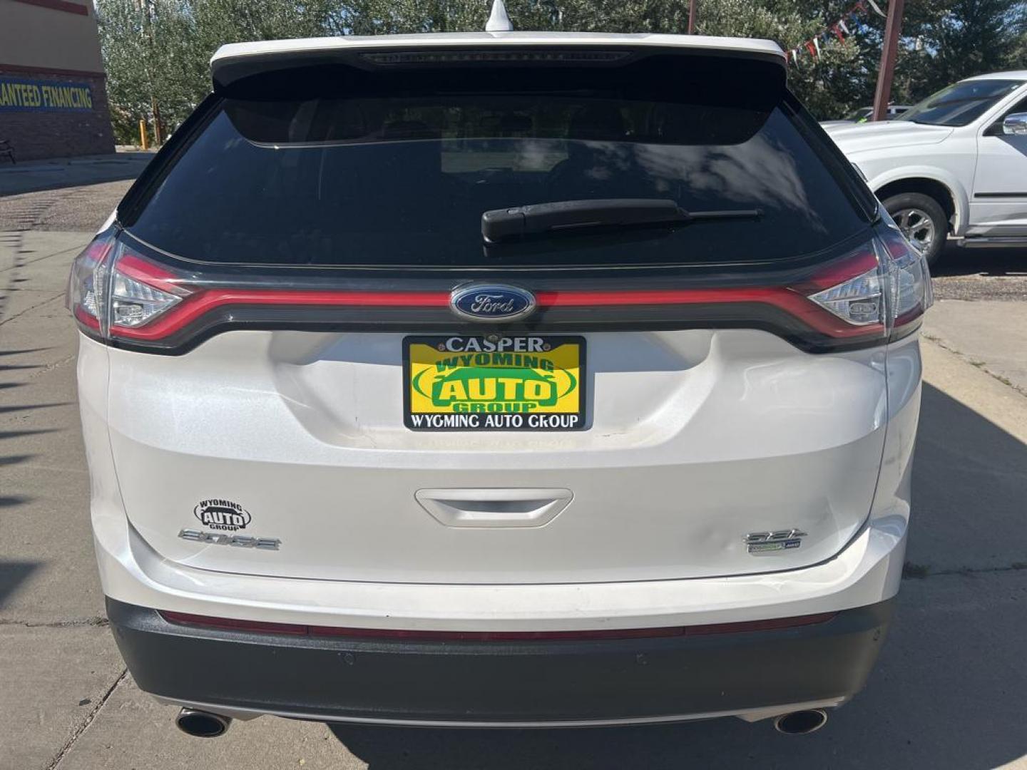 2018 white Ford Edge SEL (2FMPK4J92JB) with an 4 Cyl, 2.0L engine, Automatic transmission, located at 3030 CY Ave, Casper, WY, 82604, (307) 265-3830, 42.827816, -106.357483 - Introducing the dynamic and reliable 2018 Ford Edge SEL with AWD, a perfect blend of sophistication and performance! This remarkable vehicle is designed to elevate your driving experience with its impressive features and sleek design. Under the hood, you'll find a robust 4-cylinder, 2.0L engine that - Photo#4