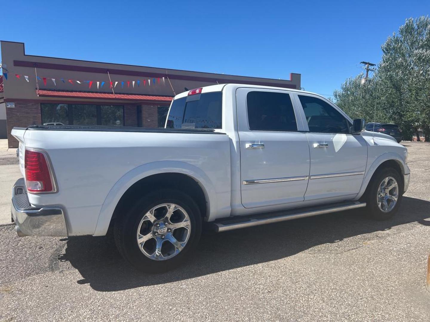 2017 white Ram 1500 Laramie (1C6RR7NT5HS) with an V8, 5.7L engine, Automatic transmission, located at 3030 CY Ave, Casper, WY, 82604, (307) 265-3830, 42.827816, -106.357483 - Photo#4