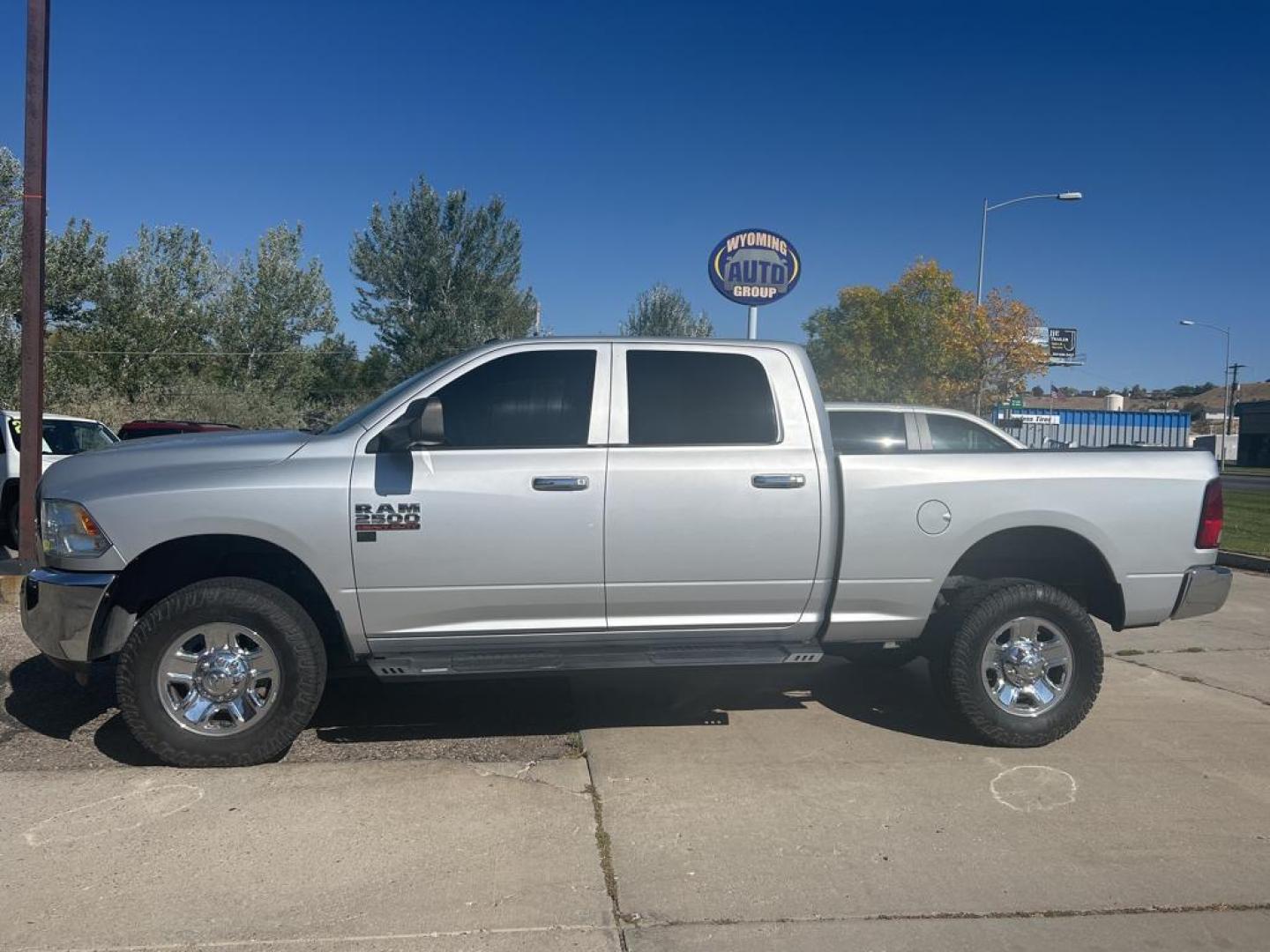 2016 silver Ram 2500 SLT (3C6TR5DT7GG) with an V8, 5.7L engine, Automatic transmission, located at 3030 CY Ave, Casper, WY, 82604, (307) 265-3830, 42.827816, -106.357483 - Unleash the power and versatility of the 2016 Ram 2500 SLT, a dynamic force ready to conquer any challenge that comes your way! This powerhouse is equipped with a robust V8, 5.7L engine, offering unparalleled performance and reliability for all your hauling and towing needs. With the confidence-insp - Photo#0