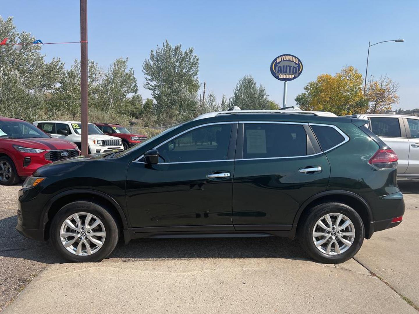 2019 green Nissan Rogue SV (5N1AT2MV6KC) with an 4 Cyl, 2.5L engine, Automatic transmission, located at 3030 CY Ave, Casper, WY, 82604, (307) 265-3830, 42.827816, -106.357483 - For sale at our dealership is a 2019 Nissan Rogue SV with All-Wheel Drive, a remarkable choice for those seeking reliability and comfort. This versatile SUV features a 4-cylinder, 2.5L engine, offering a perfect balance of power and fuel efficiency, making it ideal for both city commuting and weeken - Photo#0