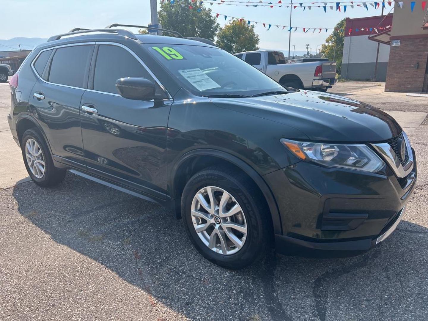 2019 green Nissan Rogue SV (5N1AT2MV6KC) with an 4 Cyl, 2.5L engine, Automatic transmission, located at 3030 CY Ave, Casper, WY, 82604, (307) 265-3830, 42.827816, -106.357483 - For sale at our dealership is a 2019 Nissan Rogue SV with All-Wheel Drive, a remarkable choice for those seeking reliability and comfort. This versatile SUV features a 4-cylinder, 2.5L engine, offering a perfect balance of power and fuel efficiency, making it ideal for both city commuting and weeken - Photo#3