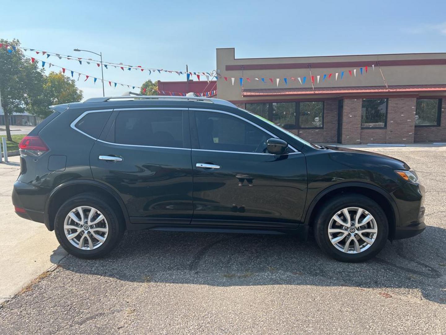 2019 green Nissan Rogue SV (5N1AT2MV6KC) with an 4 Cyl, 2.5L engine, Automatic transmission, located at 3030 CY Ave, Casper, WY, 82604, (307) 265-3830, 42.827816, -106.357483 - For sale at our dealership is a 2019 Nissan Rogue SV with All-Wheel Drive, a remarkable choice for those seeking reliability and comfort. This versatile SUV features a 4-cylinder, 2.5L engine, offering a perfect balance of power and fuel efficiency, making it ideal for both city commuting and weeken - Photo#4