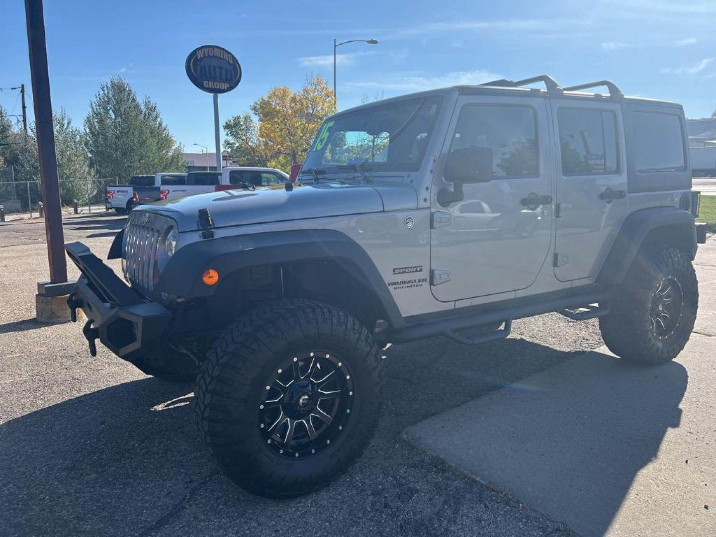 2015 silver Jeep Wrangler Unlimited Sport (1C4BJWDG4FL) with an V6, 3.6L engine, Automatic transmission, located at 3030 CY Ave, Casper, WY, 82604, (307) 265-3830, 42.827816, -106.357483 - For sale at our dealership is a robust and reliable 2015 Jeep Wrangler Unlimited Sport, perfect for those who crave adventure and off-road capability. This iconic SUV is equipped with a powerful V6, 3.6L engine and a dependable 4WD system, providing the performance you need for both city driving and - Photo#1