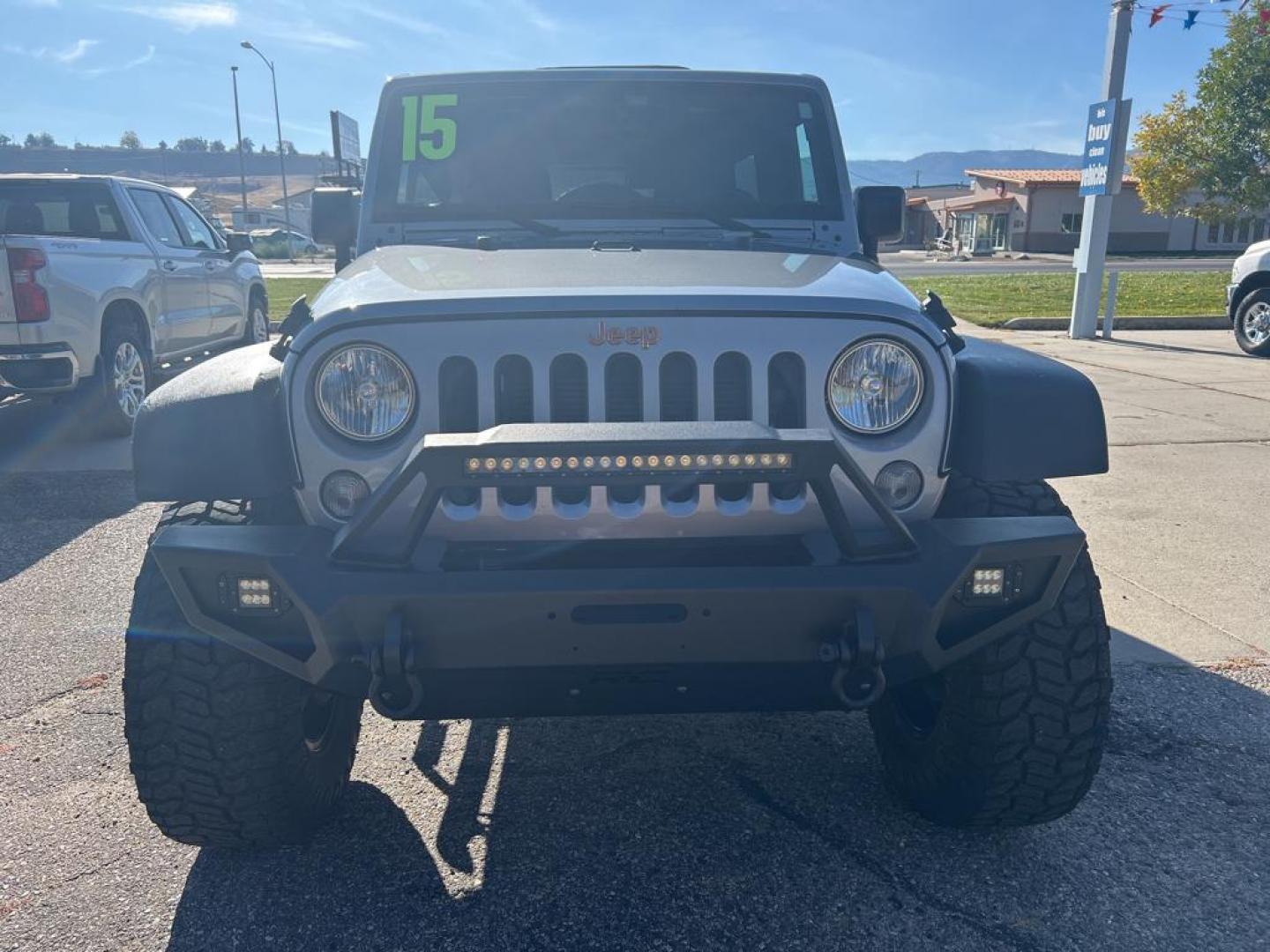 2015 silver Jeep Wrangler Unlimited Sport (1C4BJWDG4FL) with an V6, 3.6L engine, Automatic transmission, located at 3030 CY Ave, Casper, WY, 82604, (307) 265-3830, 42.827816, -106.357483 - For sale at our dealership is a robust and reliable 2015 Jeep Wrangler Unlimited Sport, perfect for those who crave adventure and off-road capability. This iconic SUV is equipped with a powerful V6, 3.6L engine and a dependable 4WD system, providing the performance you need for both city driving and - Photo#2