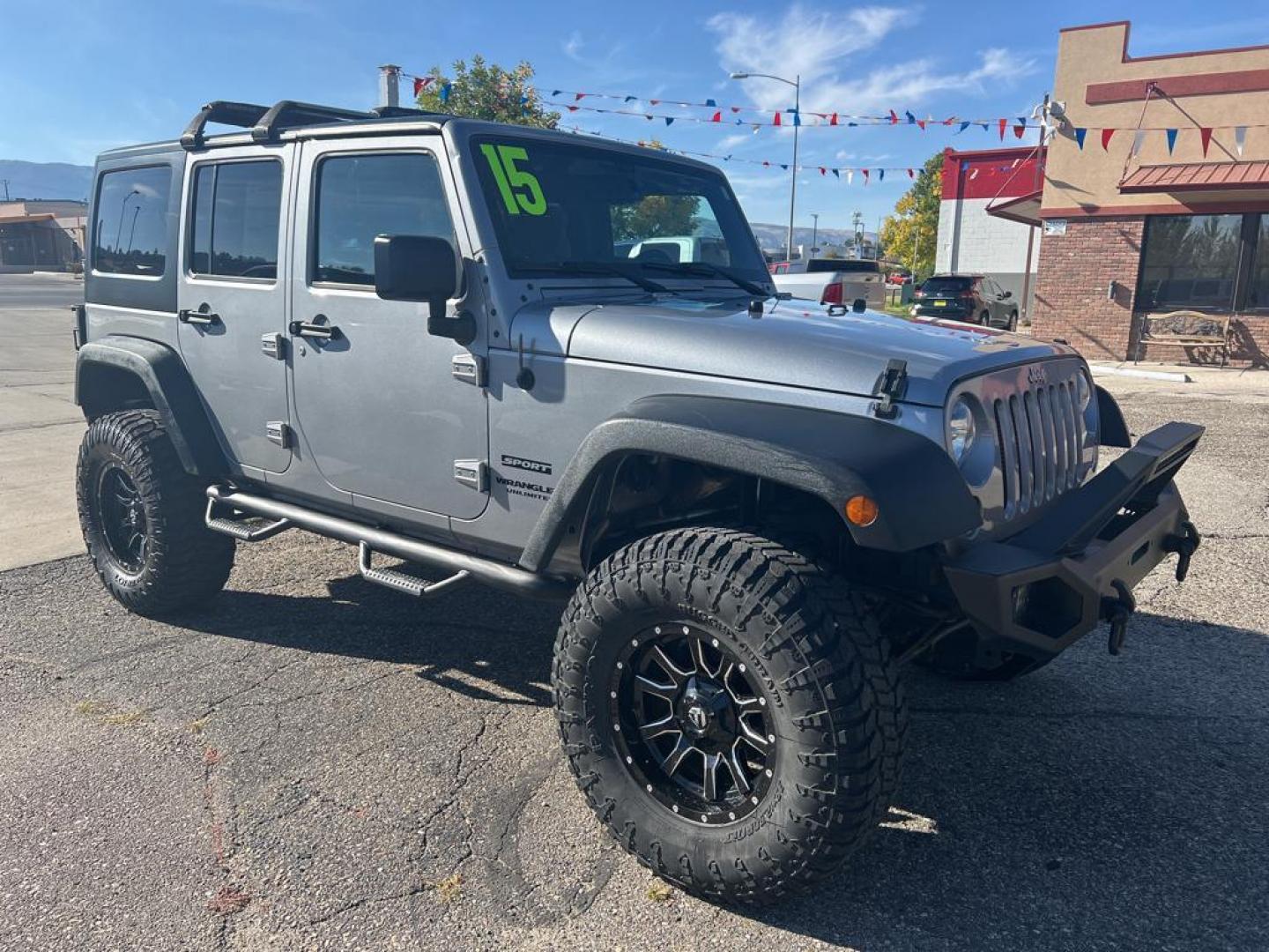 2015 silver Jeep Wrangler Unlimited Sport (1C4BJWDG4FL) with an V6, 3.6L engine, Automatic transmission, located at 3030 CY Ave, Casper, WY, 82604, (307) 265-3830, 42.827816, -106.357483 - For sale at our dealership is a robust and reliable 2015 Jeep Wrangler Unlimited Sport, perfect for those who crave adventure and off-road capability. This iconic SUV is equipped with a powerful V6, 3.6L engine and a dependable 4WD system, providing the performance you need for both city driving and - Photo#3