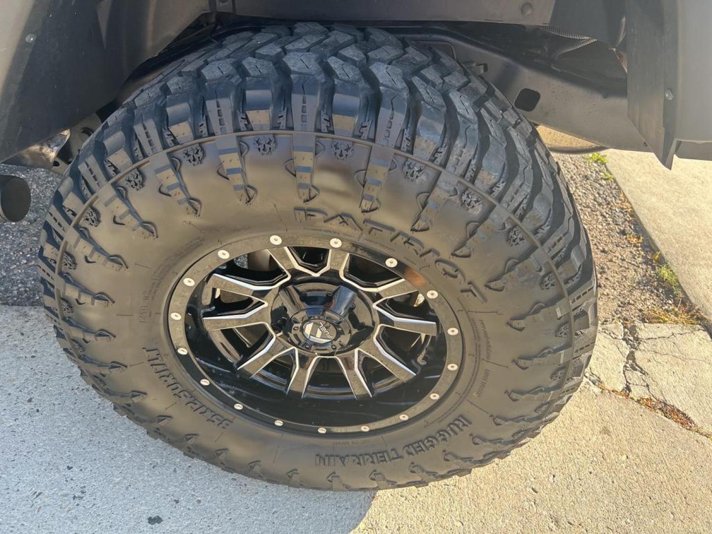 2015 silver Jeep Wrangler Unlimited Sport (1C4BJWDG4FL) with an V6, 3.6L engine, Automatic transmission, located at 3030 CY Ave, Casper, WY, 82604, (307) 265-3830, 42.827816, -106.357483 - For sale at our dealership is a robust and reliable 2015 Jeep Wrangler Unlimited Sport, perfect for those who crave adventure and off-road capability. This iconic SUV is equipped with a powerful V6, 3.6L engine and a dependable 4WD system, providing the performance you need for both city driving and - Photo#6