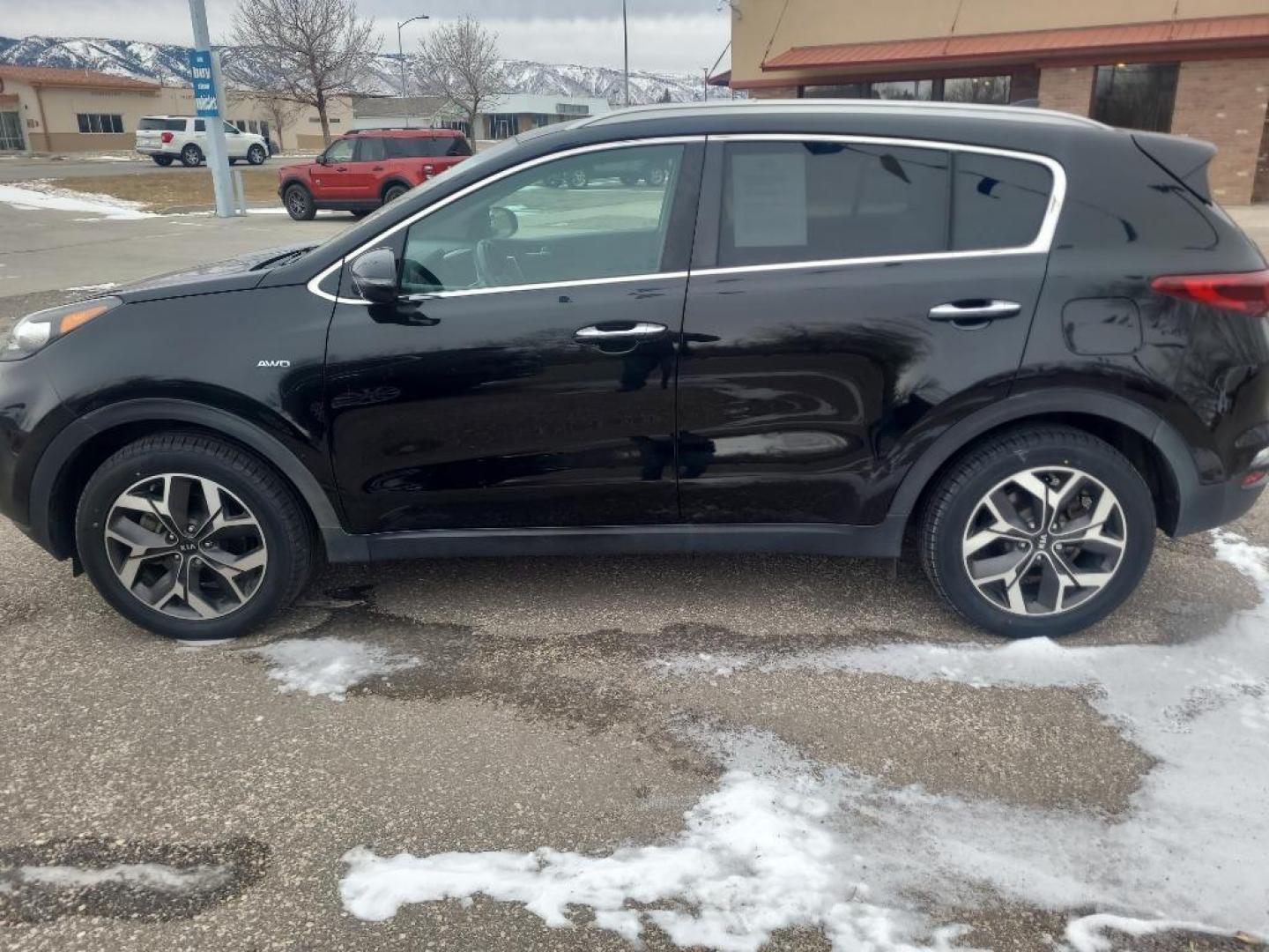 2020 Black Kia Sportage EX AWD (KNDPNCAC4L7) with an 4 Cyl, 2.4L engine, Automatic transmission, located at 3030 CY Ave, Casper, WY, 82604, (307) 265-3830, 42.827816, -106.357483 - Photo#1