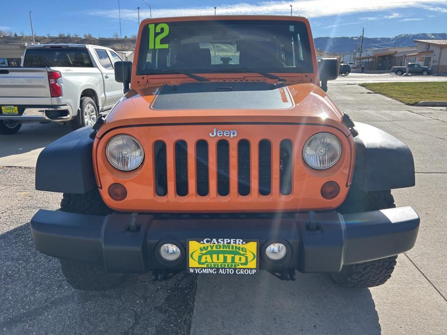 2012 orange Jeep Wrangler Sport (1C4AJWAG7CL) with an V6, 3.6L engine, Automatic transmission, located at 3030 CY Ave, Casper, WY, 82604, (307) 265-3830, 42.827816, -106.357483 - Photo#2