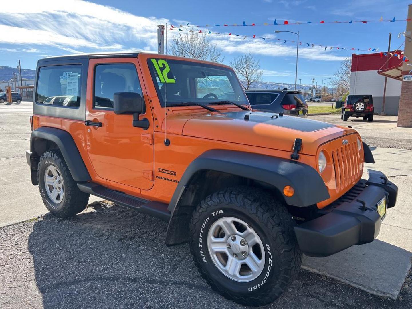 2012 orange Jeep Wrangler Sport (1C4AJWAG7CL) with an V6, 3.6L engine, Automatic transmission, located at 3030 CY Ave, Casper, WY, 82604, (307) 265-3830, 42.827816, -106.357483 - Photo#3