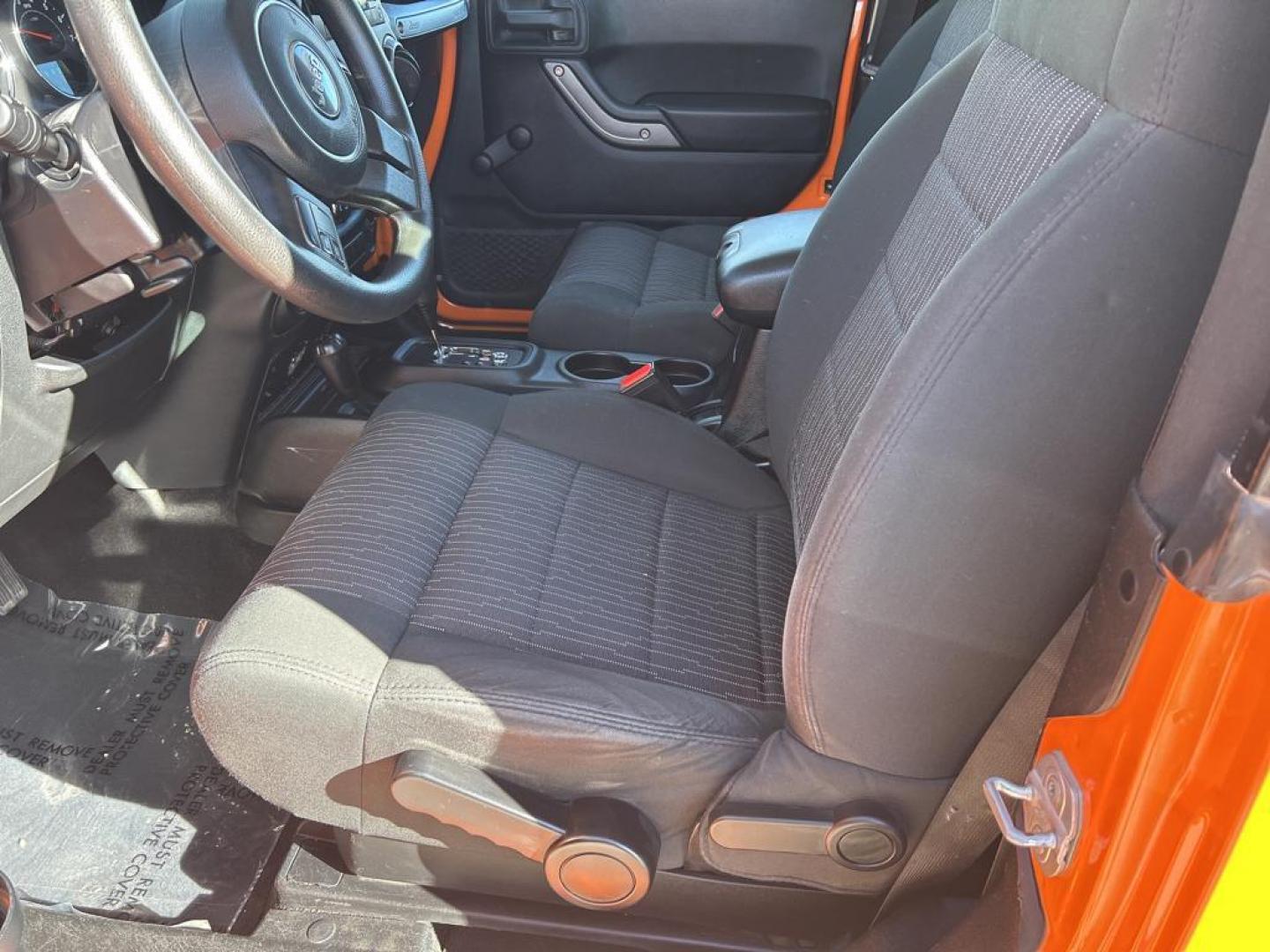 2012 orange Jeep Wrangler Sport (1C4AJWAG7CL) with an V6, 3.6L engine, Automatic transmission, located at 3030 CY Ave, Casper, WY, 82604, (307) 265-3830, 42.827816, -106.357483 - Photo#8