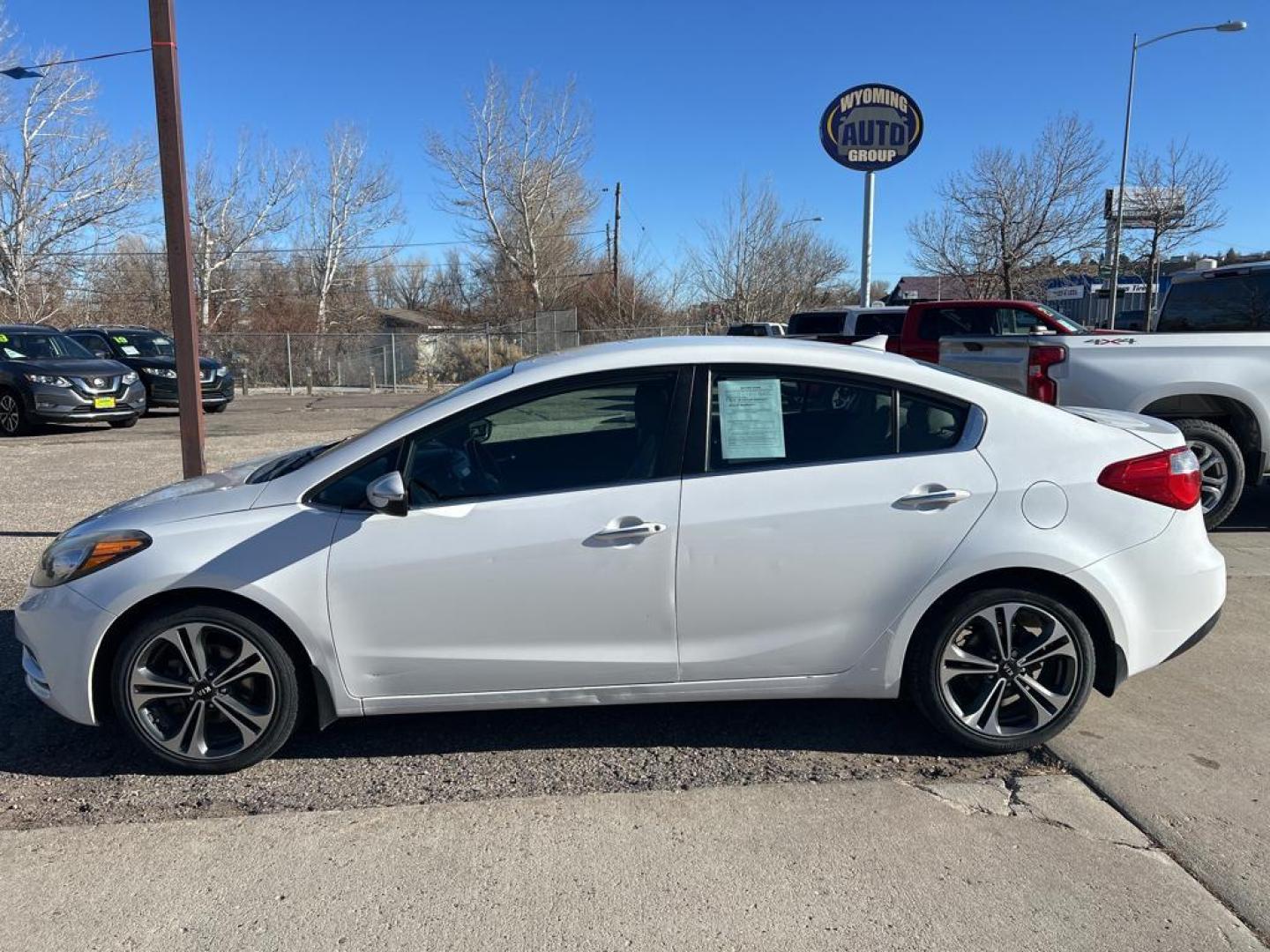 2014 WHITE Kia Forte EX (KNAFX4A84E5) with an 4 Cyl, 2.0L engine, Automatic transmission, located at 3030 CY Ave, Casper, WY, 82604, (307) 265-3830, 42.827816, -106.357483 - Photo#0