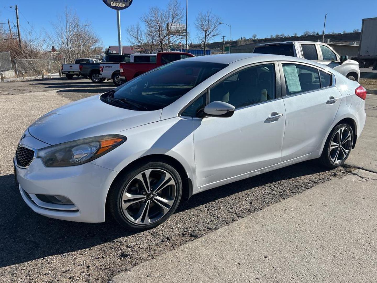 2014 WHITE Kia Forte EX (KNAFX4A84E5) with an 4 Cyl, 2.0L engine, Automatic transmission, located at 3030 CY Ave, Casper, WY, 82604, (307) 265-3830, 42.827816, -106.357483 - Photo#1