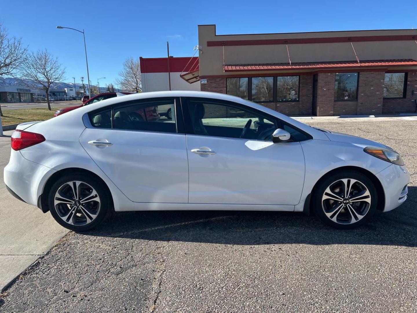 2014 WHITE Kia Forte EX (KNAFX4A84E5) with an 4 Cyl, 2.0L engine, Automatic transmission, located at 3030 CY Ave, Casper, WY, 82604, (307) 265-3830, 42.827816, -106.357483 - Photo#4