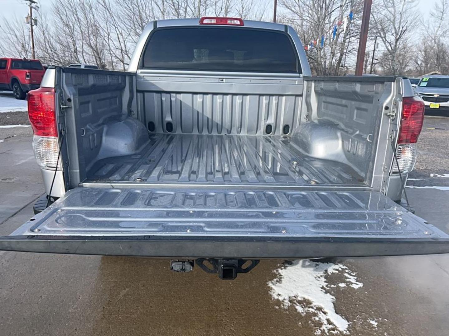 2013 silver Toyota Tundra GRADE (5TFDW5F16DX) with an V8, 5.7L engine, Automatic transmission, located at 3030 CY Ave, Casper, WY, 82604, (307) 265-3830, 42.827816, -106.357483 - Discover the rugged dependability of the 2013 Toyota Tundra, a robust full-size pickup truck that offers both power and versatility. This model, equipped with a formidable 4WD system and a V8, 5.7L engine, is engineered to handle demanding tasks with ease, making it an ideal choice for both work and - Photo#11