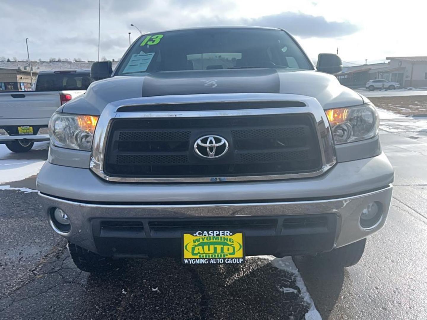 2013 silver Toyota Tundra GRADE (5TFDW5F16DX) with an V8, 5.7L engine, Automatic transmission, located at 3030 CY Ave, Casper, WY, 82604, (307) 265-3830, 42.827816, -106.357483 - Discover the rugged dependability of the 2013 Toyota Tundra, a robust full-size pickup truck that offers both power and versatility. This model, equipped with a formidable 4WD system and a V8, 5.7L engine, is engineered to handle demanding tasks with ease, making it an ideal choice for both work and - Photo#2