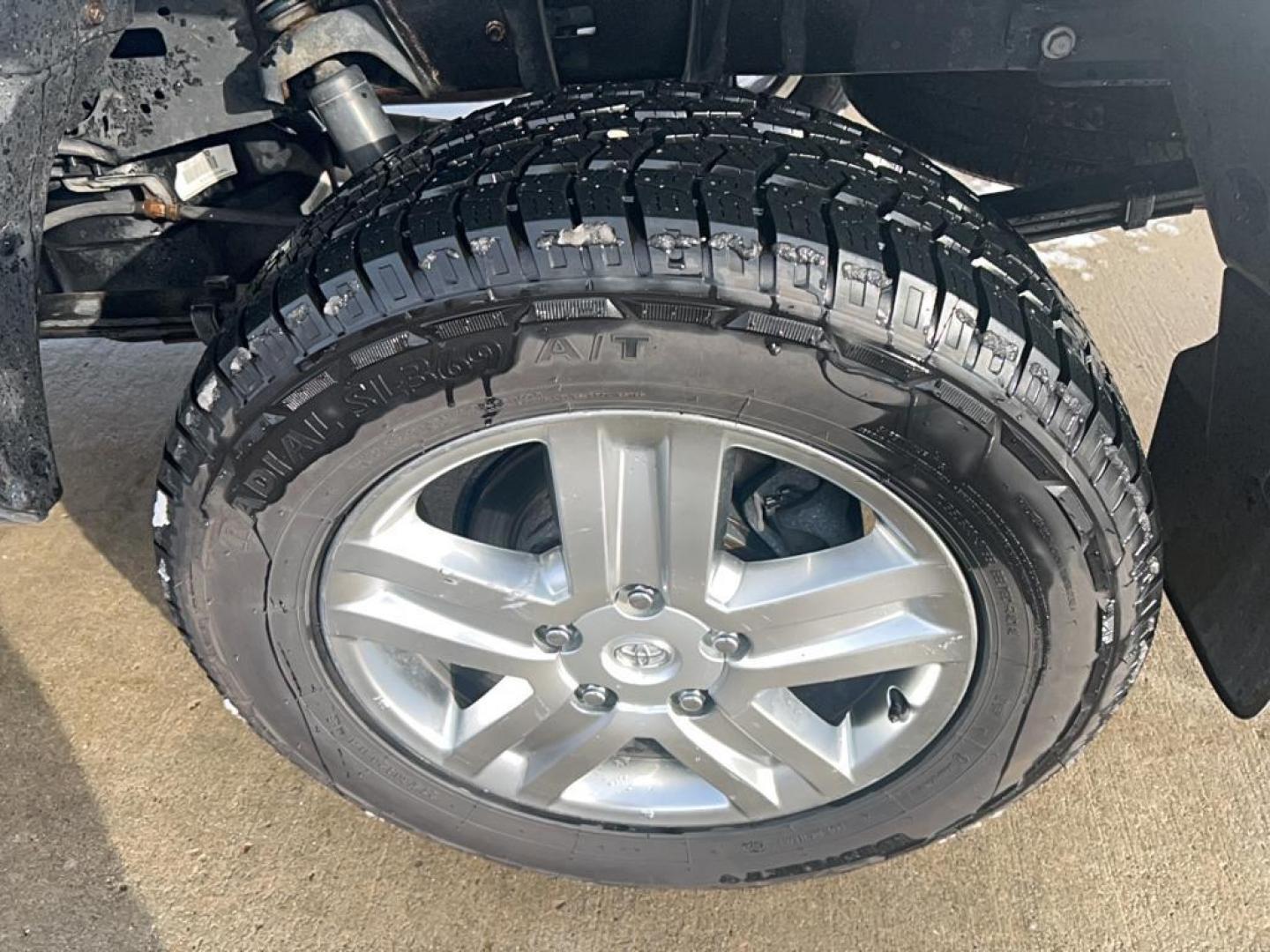 2013 silver Toyota Tundra GRADE (5TFDW5F16DX) with an V8, 5.7L engine, Automatic transmission, located at 3030 CY Ave, Casper, WY, 82604, (307) 265-3830, 42.827816, -106.357483 - Discover the rugged dependability of the 2013 Toyota Tundra, a robust full-size pickup truck that offers both power and versatility. This model, equipped with a formidable 4WD system and a V8, 5.7L engine, is engineered to handle demanding tasks with ease, making it an ideal choice for both work and - Photo#6