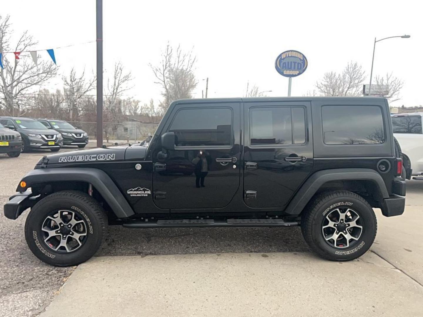 2013 black Jeep Wrangler Unlimited Rubicon (1C4HJWFG6DL) with an V6, 3.6L engine, Automatic transmission, located at 3030 CY Ave, Casper, WY, 82604, (307) 265-3830, 42.827816, -106.357483 - Photo#0