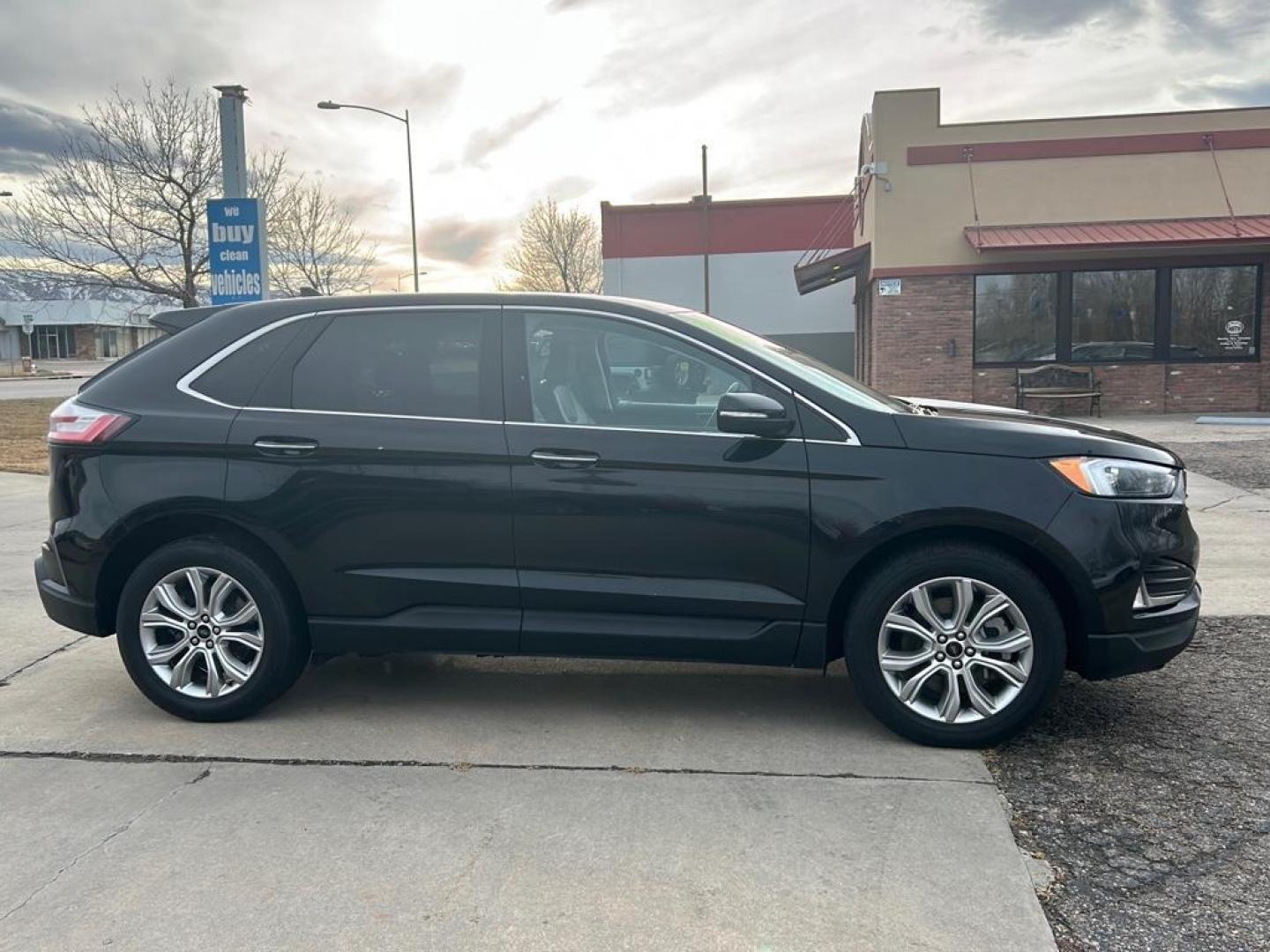 2022 Black Ford Edge Titanium (2FMPK4K92NB) with an 4 Cyl, 2.0L engine, Automatic transmission, located at 3030 CY Ave, Casper, WY, 82604, (307) 265-3830, 42.827816, -106.357483 - Photo#4