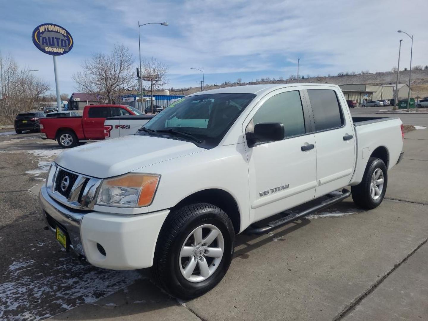 2012 WHITE Nissan Titan SV (1N6AA0EJ6CN) with an V8, 5.6L engine, Automatic transmission, located at 3030 CY Ave, Casper, WY, 82604, (307) 265-3830, 42.827816, -106.357483 - Extra clean , low mileage, local trade in. Looks and runs great! V8 power! 4WD! - Photo#0