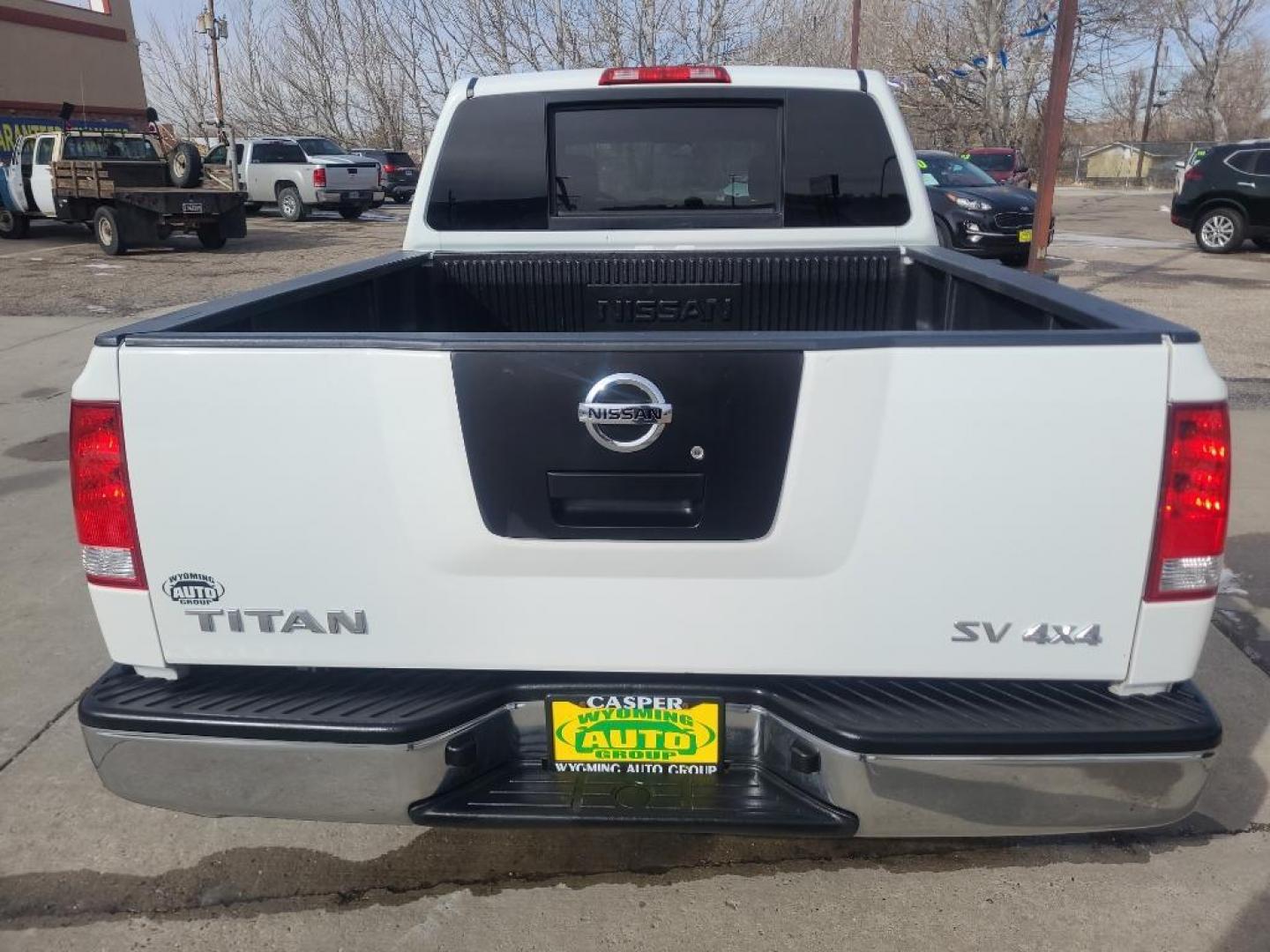 2012 WHITE Nissan Titan SV (1N6AA0EJ6CN) with an V8, 5.6L engine, Automatic transmission, located at 3030 CY Ave, Casper, WY, 82604, (307) 265-3830, 42.827816, -106.357483 - Extra clean , low mileage, local trade in. Looks and runs great! V8 power! 4WD! - Photo#4