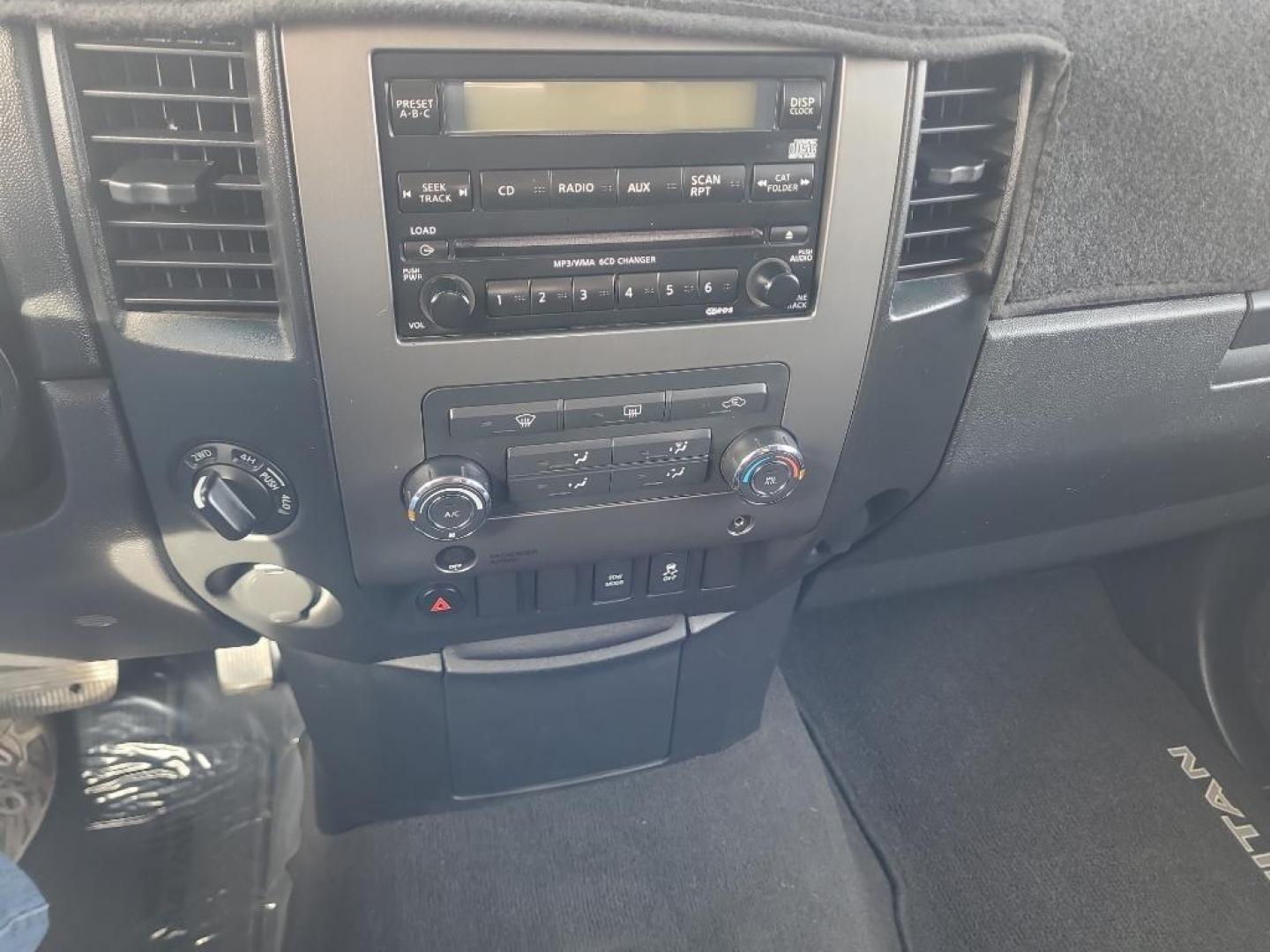 2012 WHITE Nissan Titan SV (1N6AA0EJ6CN) with an V8, 5.6L engine, Automatic transmission, located at 3030 CY Ave, Casper, WY, 82604, (307) 265-3830, 42.827816, -106.357483 - Extra clean , low mileage, local trade in. Looks and runs great! V8 power! 4WD! - Photo#8